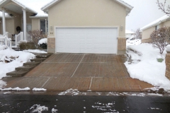 retrofit-concrete-driveway-during-snowstorm