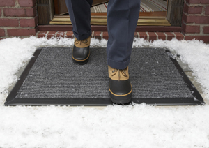 Heated door mat eliminates ice and keeps area clear