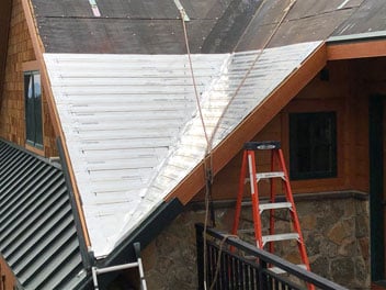 Invizimelt installed beneath standing seam roofing